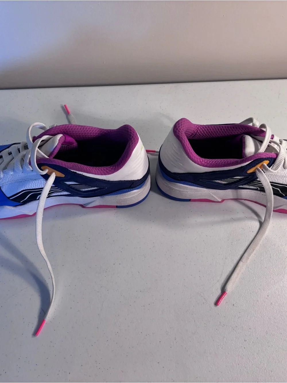Puma White Sneakers with Blue, Pink and Yellow Accents